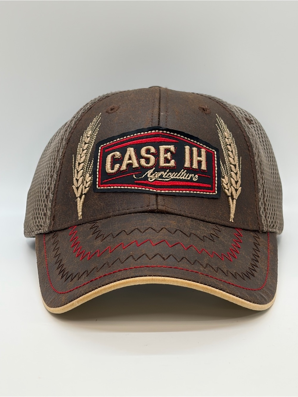 CHOKO Case IH Agriculture Distressed Leather Trucker Hat | Officially Licensed